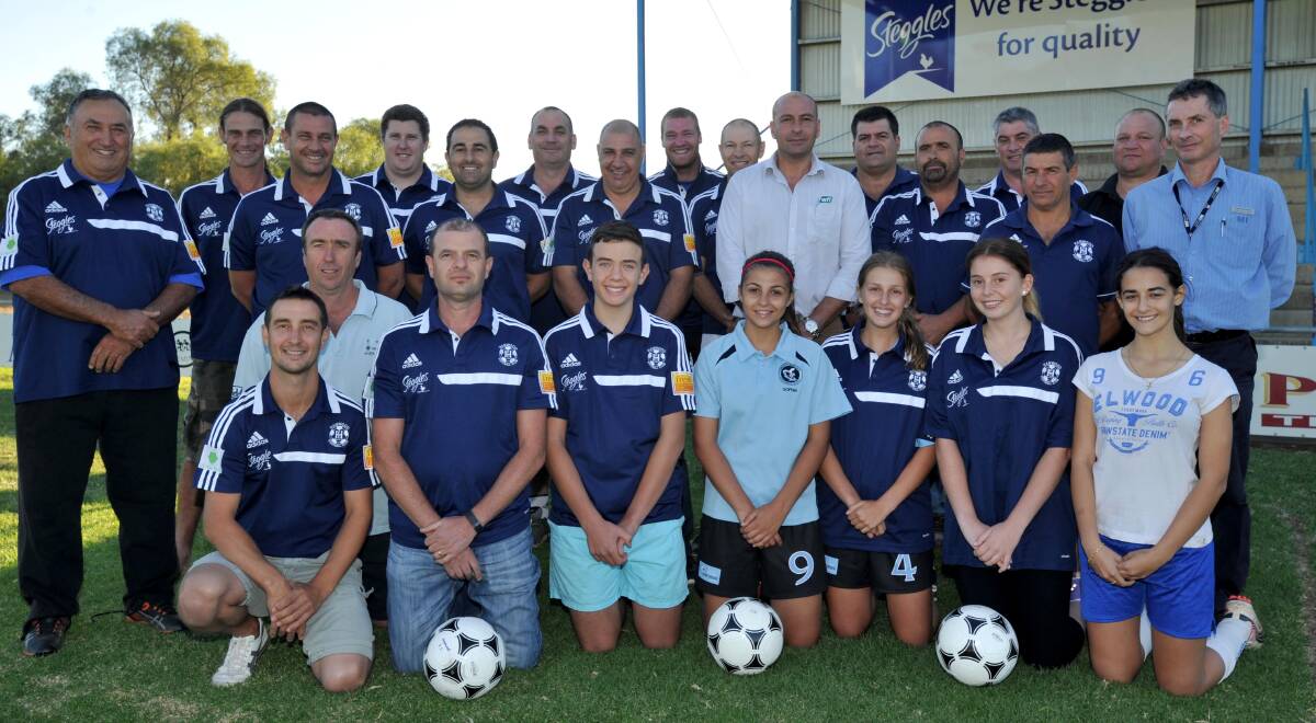 SIXTY YEARS STRONG: Hanwood Football Club's junior and senior coaching and management staff for 2015. Picture: Anthony Stipo