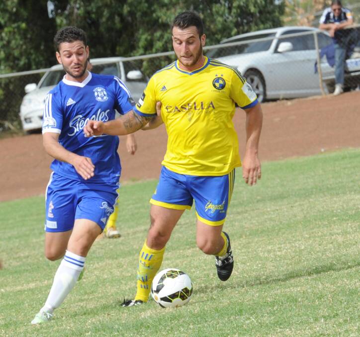 DOUBLE UP: Josh Bagiante, right, will lead one of the Yoogali FC teams in the GDFA first grade competition this season. PHOTO: Anthony Stipo