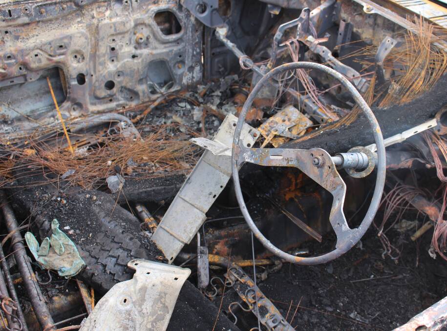 SCORCHED: The gutted inside the Ford Courier that was set alight over the weekend. Picture: Ben Jaffrey.