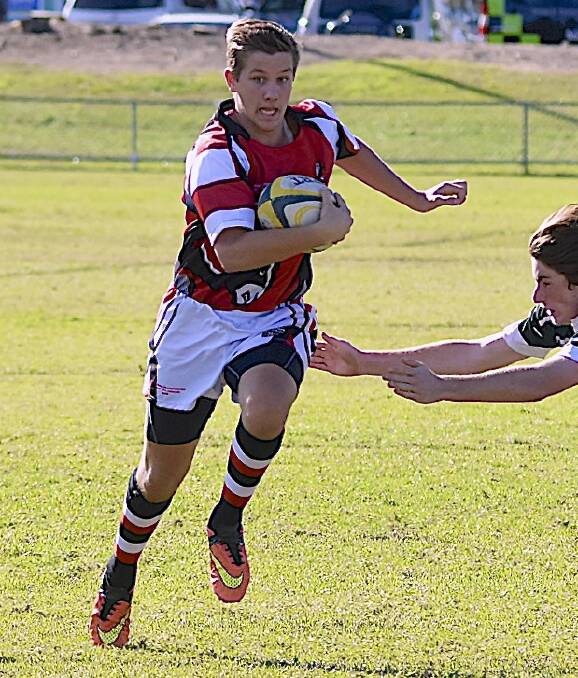 POWER: Southern Inland's Nick Jones escapes the clutches of a defender on the weekend. Picture: Steven Parisotto