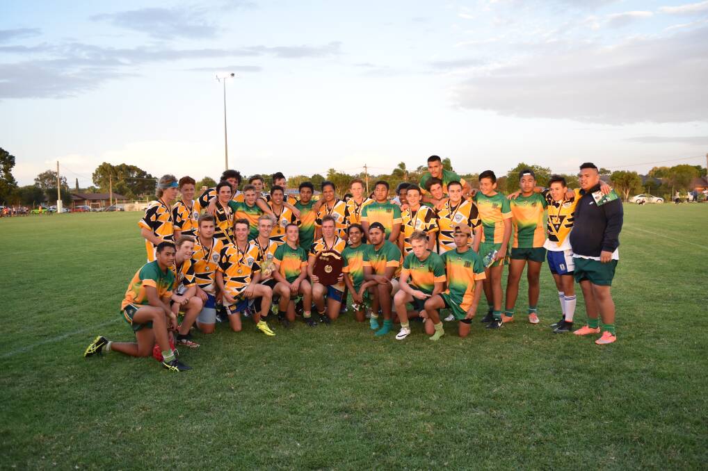 CLOSE MATCH: Griffith High School and Wade High School's under 16s teams come together after the match on Monday evening at the Coro Club Oval. PHOTOS: Ben Jaffrey
