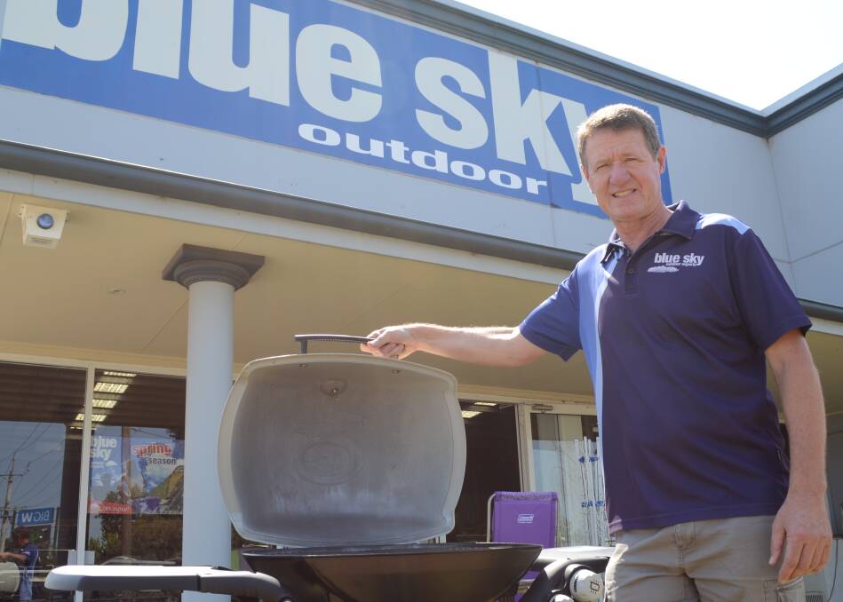 BEST BARBIE: Martin West shows off the most popular barbecue sold at his store. Picture: Ben Jaffrey.