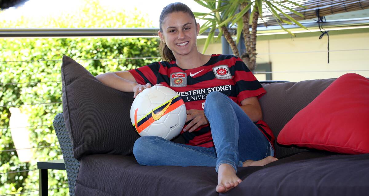 DOWN TIME: Eliza Ammendolia relaxes at her family home. She rarely is able to come back to Griffith due to school and football commitments in Sydney. Picture: Anthony Stipo.