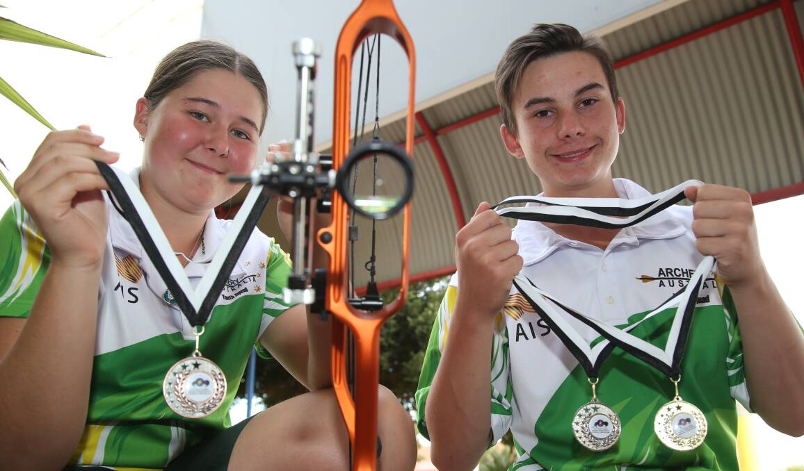 BULLSEYE: Emily Ruskin and Nathan Rowley show off their medals from the Trans Tasman Archery Challenge. Picture: Anthony Stipo