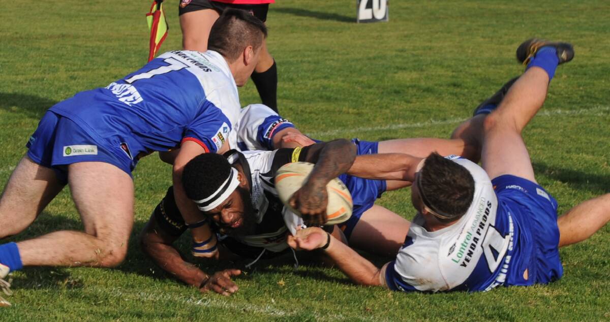 LAST GAME: Black and White Tomasi Caqusau reaches out for the line against the Yenda Blueheelers on Sunday at Wade Park. Picture: Ben Jaffrey