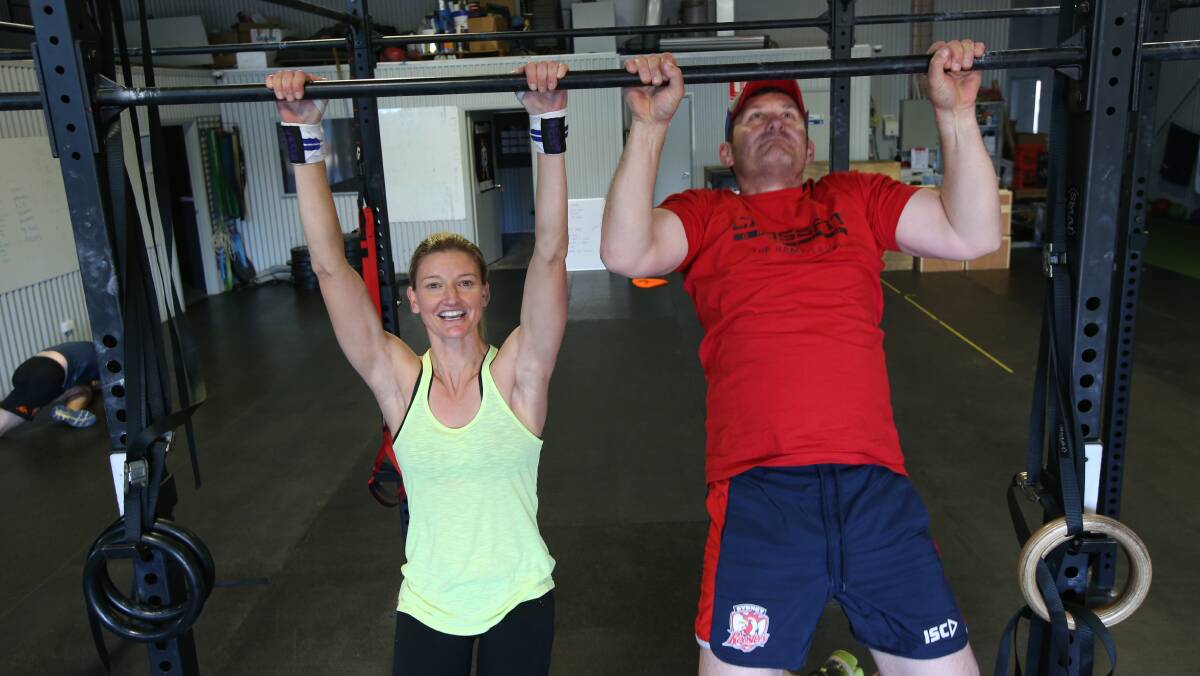 TRAINING: Sharon Careri and Greg Dreyer prepare for the LiveFit CrossFit Throwdown. Picture: Anthony Stipo