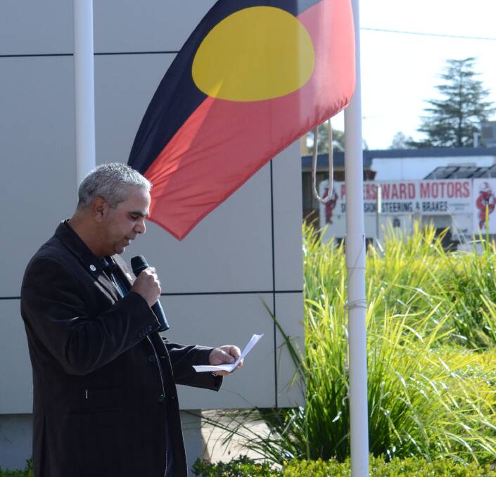 ACKNOWLEDGMENT: Griffith City Council Aboriginal liaison officer Roger Penrith addresses the crowd at the NAIDOC Week flag-raising ceremony. Picture: Ben Jaffrey.