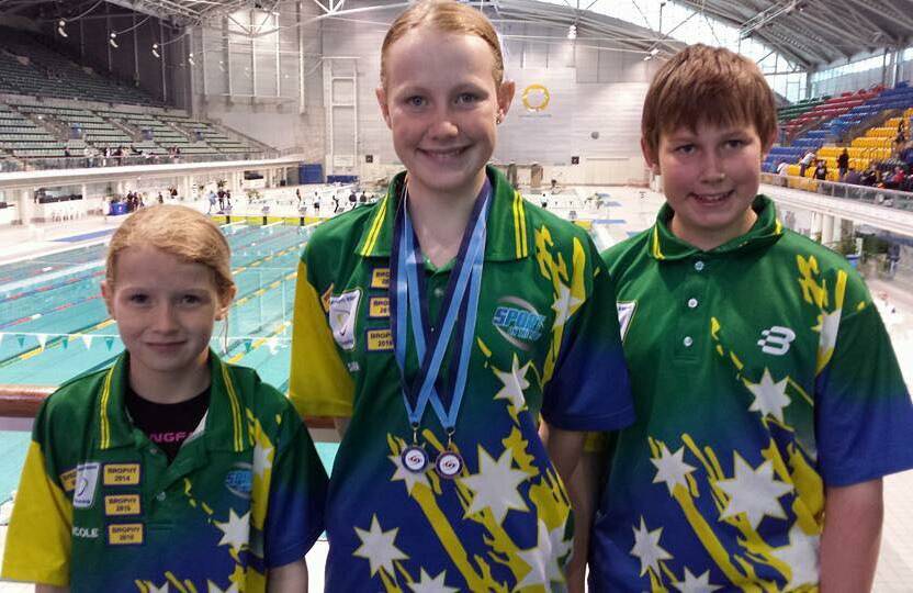 FAST TIMES: Nicole, Samantha and Patrick Taylor along with Emmerson Waide competed at the NSW Achiever Squad meet. Picture: Supplied