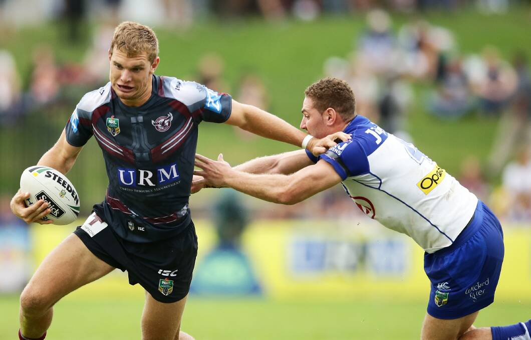 FANTASTIC FORM: Manly's Tom Trbojevic takes on the defence of the Canterbury Bulldogs at Lottoland on March 25. PHOTO: Matt King/Getty Images