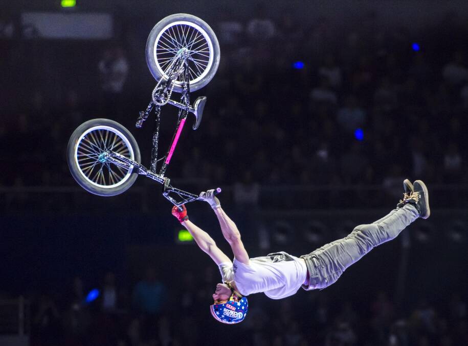 UPSIDE DOWN: Kurtis Downs performas one of the many stunts patrons can expect to see when Travis Pastrana’s Nitro Circus Live hits EW Moore Oval. Picture: Supplied