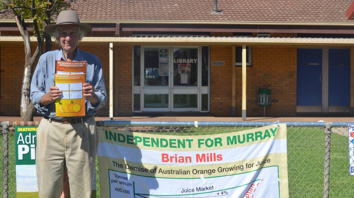ELECTION: Brian Mills stand outside the Griffth East Public School polling booth on election day. Picture: Ben Jaffrey.