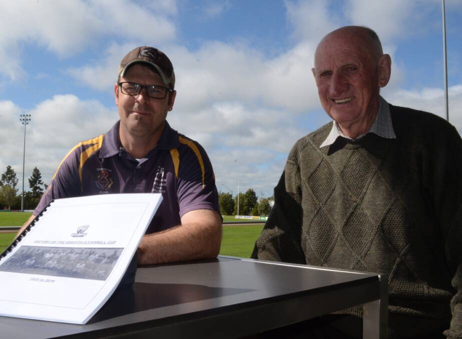 FINAL CALL: Brenton Harrison and Joe Cudmore with the final draft of the book set to be released in November this year. Picture: Ben Jaffrey