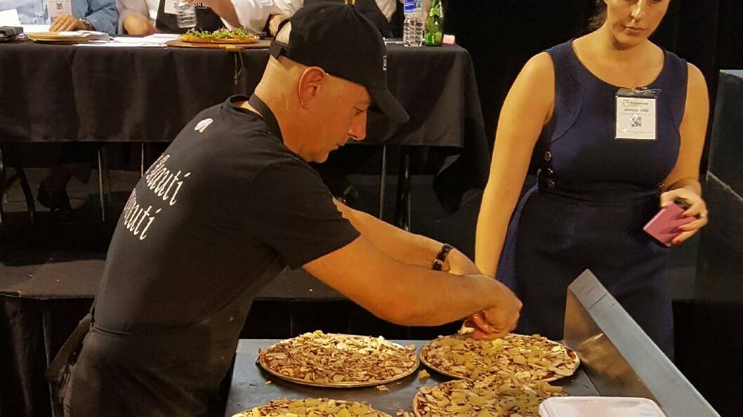 MOUTH-WATERING: Bruno Catanzariti hard at work during the Global Pizza Challenge over the weekend.