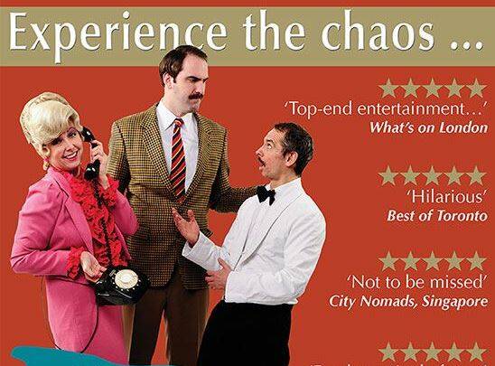 FINE DINING: Basil, Sybil and Manuel serve audience members in the interactive 'Faulty Towers - The Dining Experience'.