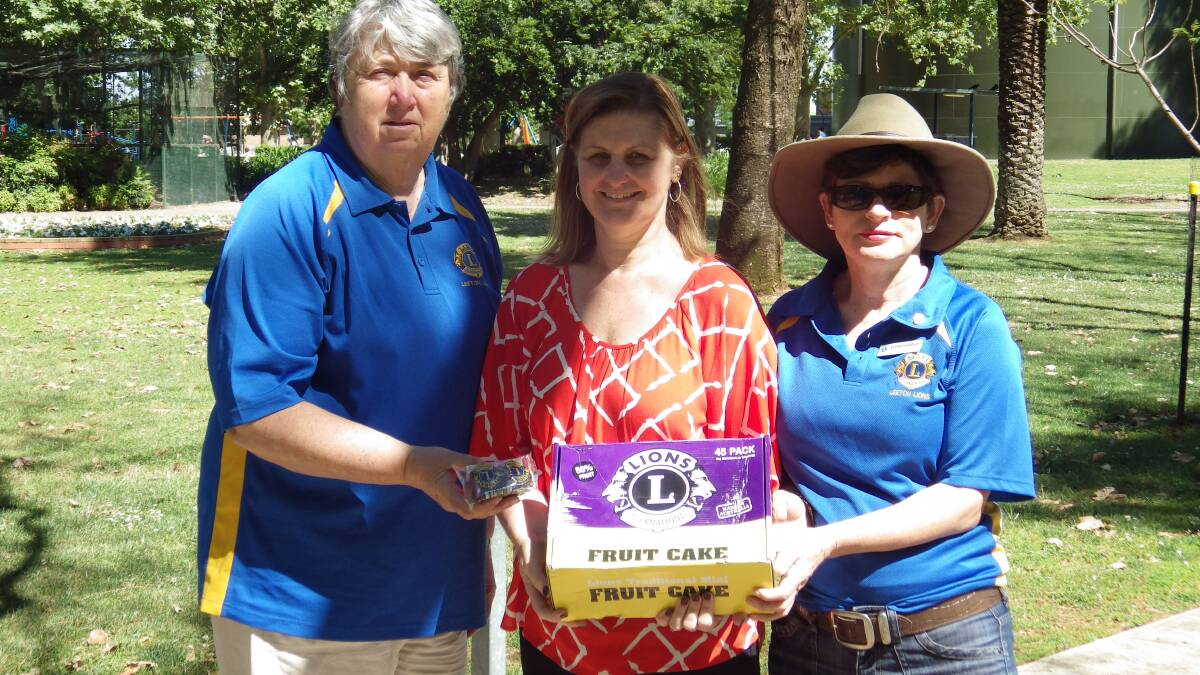 HELPING to bring Christmas cheer to those that need a little extra is something the Leeton Lions Club takes pride in. 
Tanya Lewis of Meals on Wheels (middle) receives a donation of Lions Cake slices from vice president Jackie Strempel (left) and member Katie McCavanough. 
Click the photo for the story.