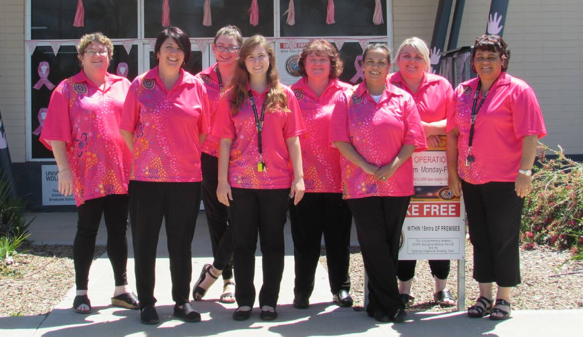 PINK UP GRIFFITH: GRIFFITH AMS staff Lisa Penrith, Melissa Cummings, Nicole Dunn, Karolina Gregory, Sharon Currie, Kerry Williams, Kylie Whitworth and Shirley Blomeley.
