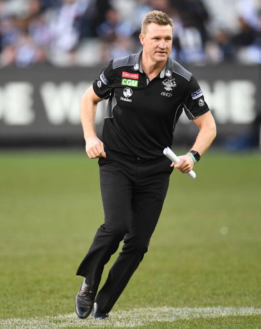 KEEP HIM ON: Michael 'Speedy' Stratton has urged the Collingwood board to keep Nathan Buckley on as head coach. PHOTO: AAP