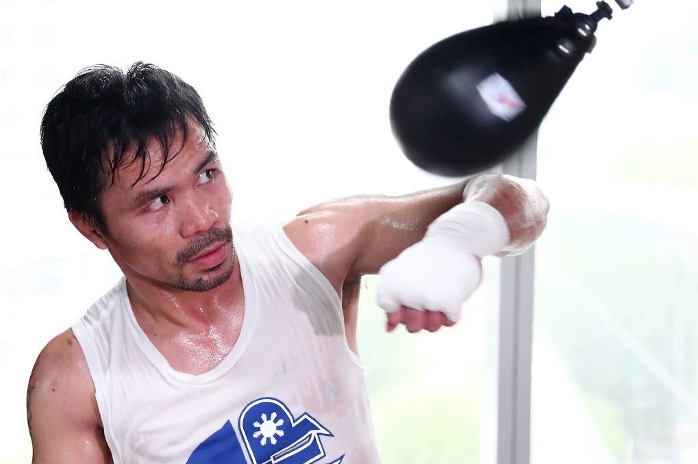 PUNCHING AWAY: Manny Pacquiao training in preperation for his fight against Jeff Horn on Sunday afternoon. PHOTO: Chris Hyde / Stringer