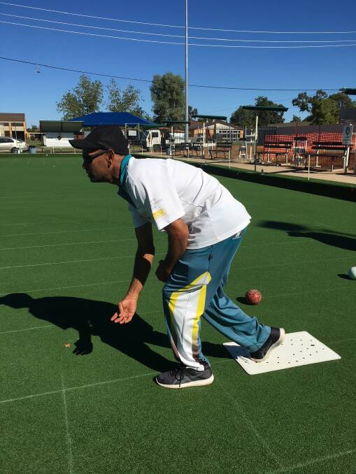 HAVING A ROLL: Mick Kilby bowling in the men’s pairs. PHOTO: Supplied