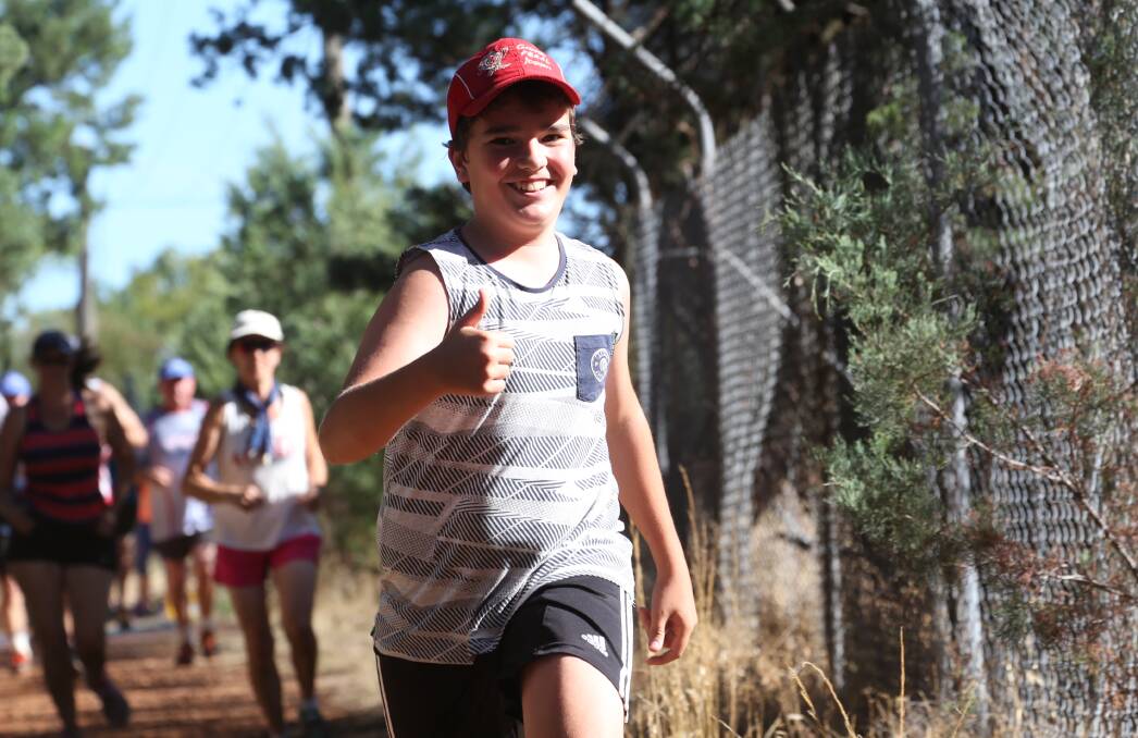 THUMBS UP: Lachlan O'Grady gives his tick of approval to the free run joggers course set up for the Feral Joggers last weekend. PHOTO: Anthony Stipo