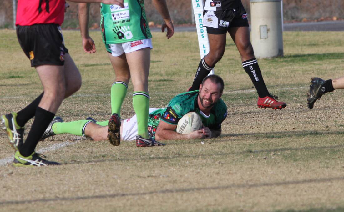 OVER THE LINE: Leeton's coach Brent Pike crosses for a try during their win over Hay last weekend. PHOTO: Talia Pattison