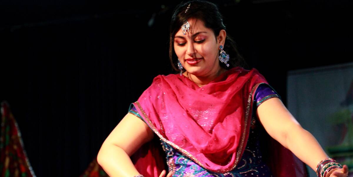 CELEBRATION OF CULTURE: Harpreet Chugha does a traditional dance at the Tiaan Festival similar to those that will be on show at the Yoogali Club this weekend. Picture: Anthony Stipo.