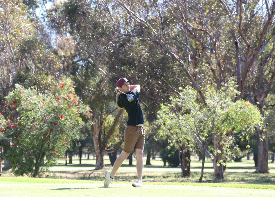 NICE SWING: Ryan Harris takes a shot at the Griffith Golf Club on Saturday in fine spring weather. Picture: Anthony Stipo