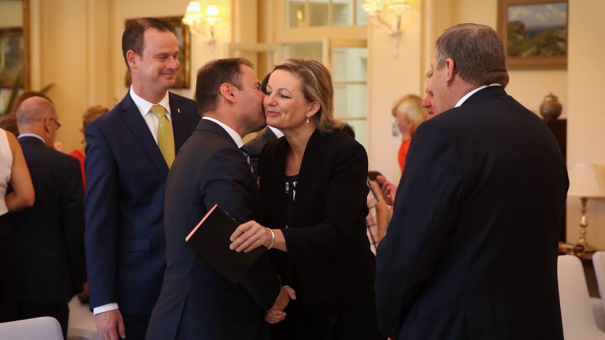 Different times: Josh Frydenberg and Sussan Ley in 2014 when she was sworn in as health minister. Ms Ley has rejected a citizenship audit, citing Mr Frydenberg's situation to buttress her position.