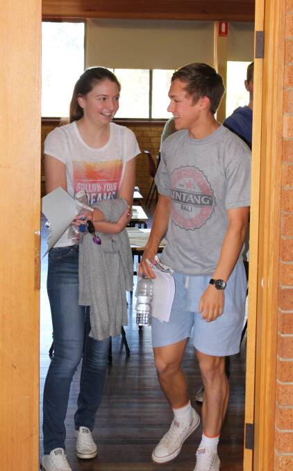Wade High students Claudia Schmetzer and Nathan Snaidero exiting the hall after their English exams. Picture: Riley Krause.