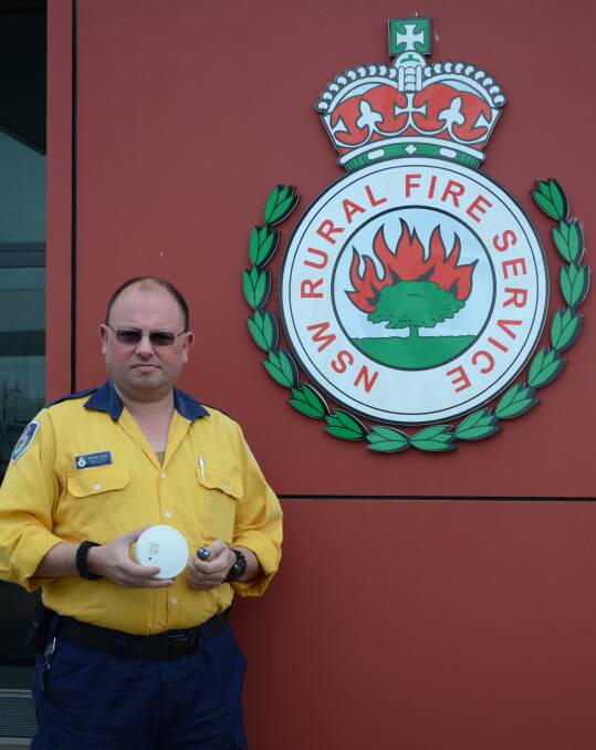 SAFETY TIPS: NSW Rural Fire Service's district technical officer Michael Borg knows that working fire alarms are an important household item. Picture: Riley Krause