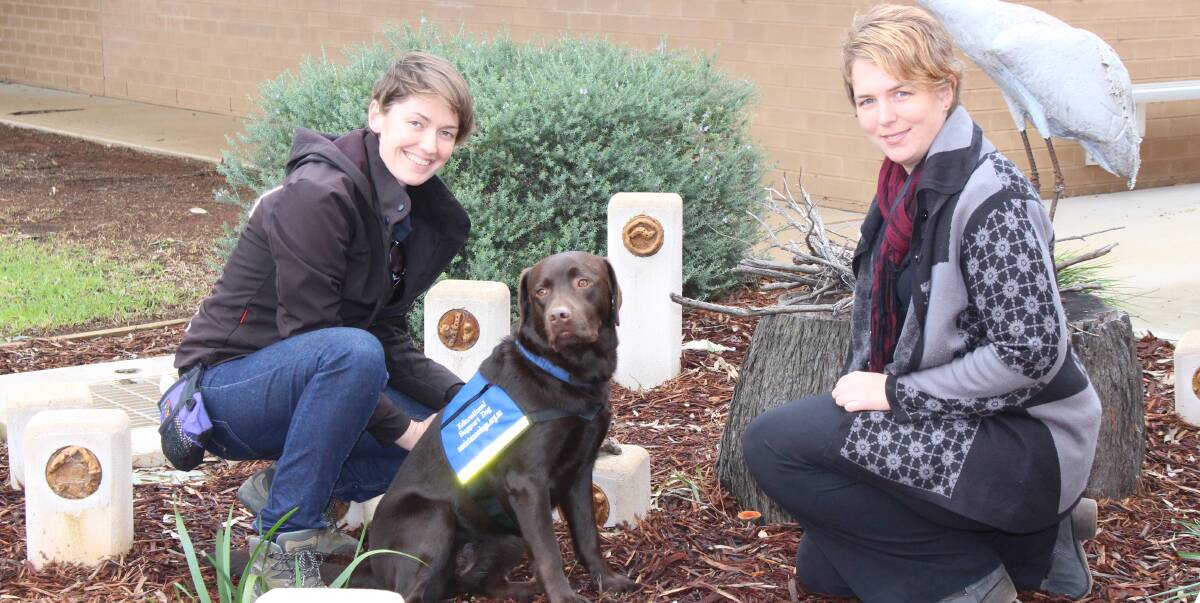 NEW ADDITION: Instruction team leader at Assistance Dogs Australia Katie Saran, assistance dog Echo and Kalinda principal Belinda Wallace. Picture: Riley krause