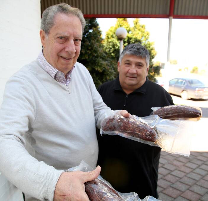 MOUTH-WATERING: Event organiser Roy Catanzariti and salami maker Tony Sergi are ready to go for this year's Festa Delle Salsicce. Picture: Anthony Stipo.
