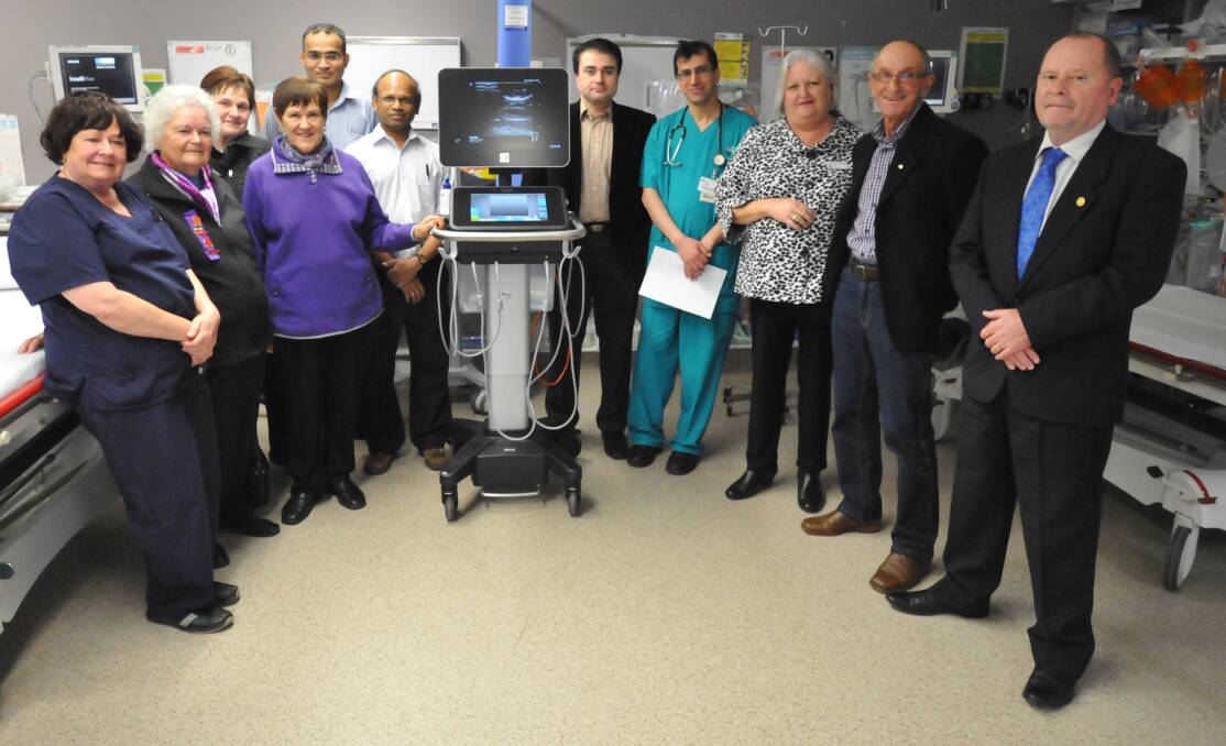 GENEROUS: Representatives of the Griffith Base Hospital United Hospitals Auxiliary, the Rotary Club of Griffith gather around the new ultrasound machine. Picture: Riley Krause