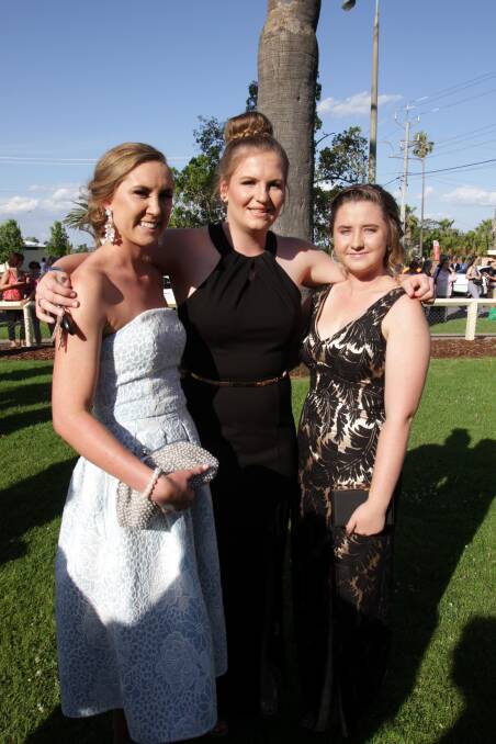 Sophie Tyson, Jess Murphy (middle) and Bree Chambers at the St Francis College year 12 formal in November last year.  