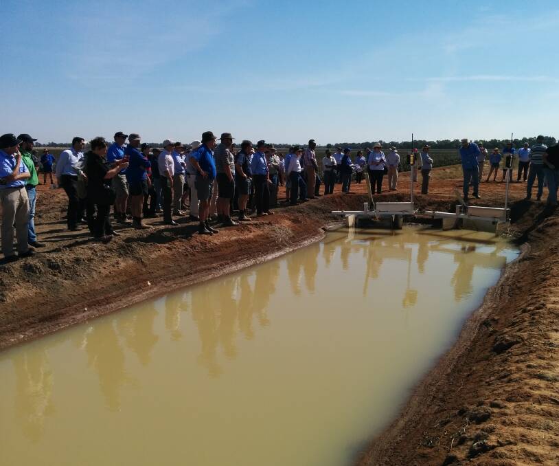 PART TO PLAY: Field day attendees at Whitton observe as an irrigation structure is opened with the touch of a button. Photo: Contributed 