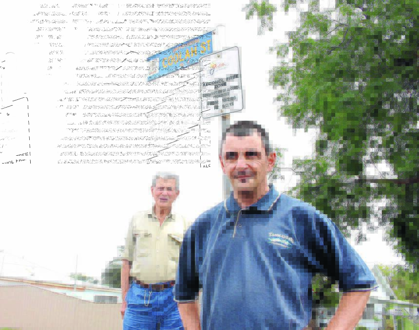 STANDING VIGILANT AGAINST CRIME: Patrick and Guido Di Cuffa on Coolah Street where a flat was robbed at the weekend. Picture: Brodie Owen