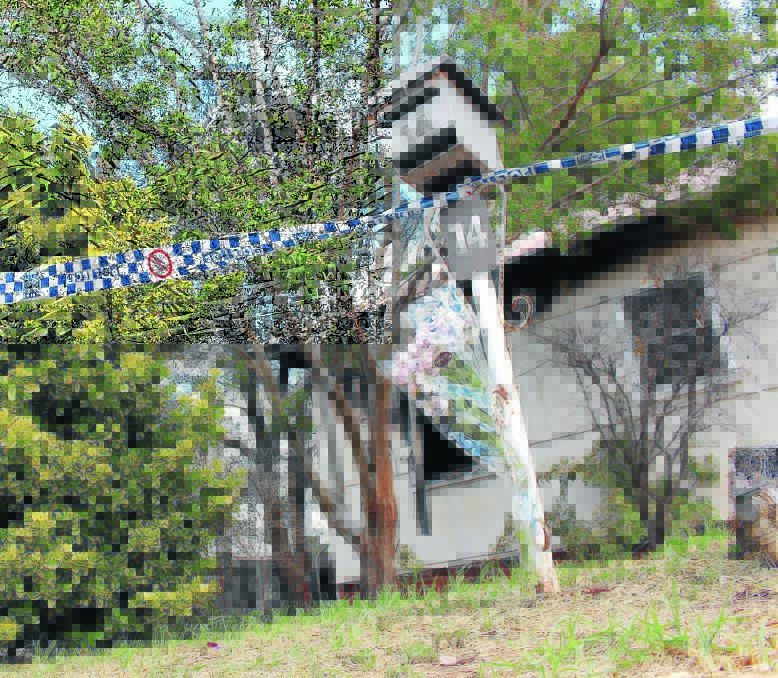 TRIBUTE: A bouquet of flowers is left by the letterbox belonging to a man who died in a fire inside his Macarthur Street home. Police have not determined a cause of the blaze. Picture: Brodie Owen