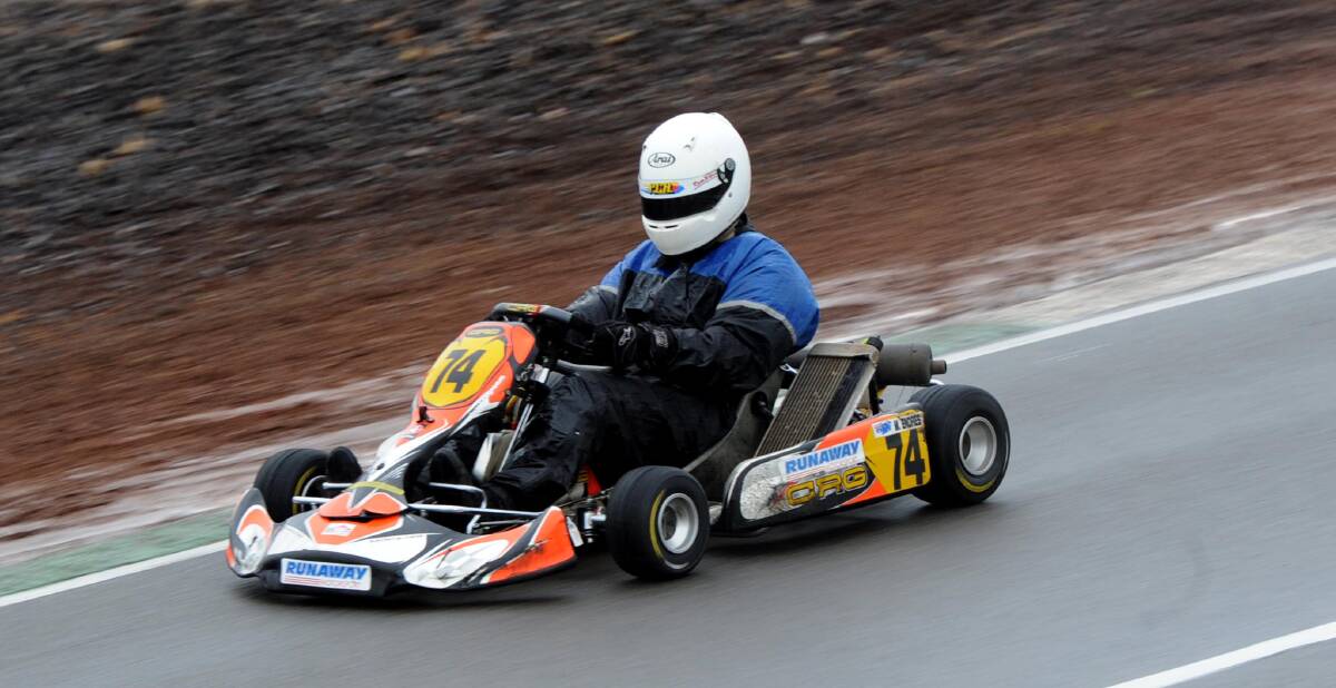 QUICK: Matthew Endres doesn't let the wet track slow him down at the NSW kart titles. More than 130 entries were received for the event.