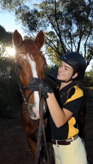 BOND: Griffith dressage competitor Sally Groat and her favourite horse, Jaffa. Picture: Anthony Stipo