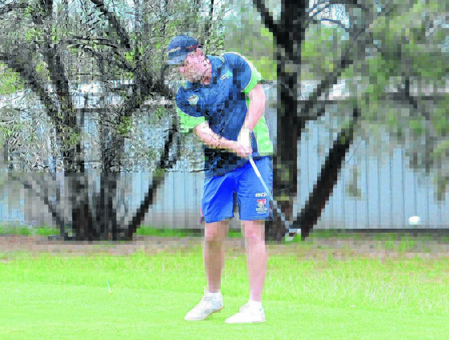 CONTACT: Glenn Punch blasts the ball from the 10th tee  and sends it flying down the fairway at Griffith Golf Club during his round. Picture: Wendy Simpkin. 