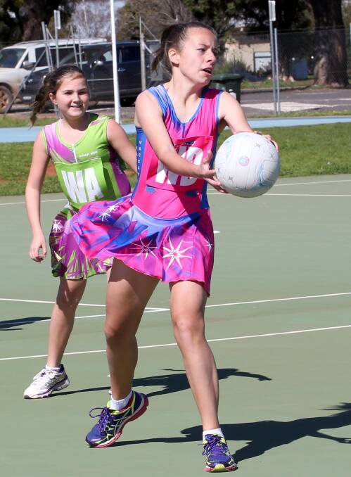GOT IT: Cupcakes wing defence Lauren Bertolin takes possession for her netball side in the semi-final against Lil Chicks. Picture: Anthony Stipo