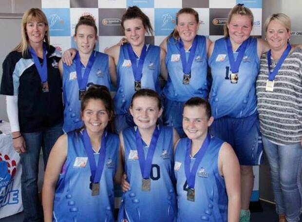 CHAMPIONS: The Griffith under 16 girls are all smiles after winning their Western Junior League grand final. Picture: Byron Geddes, Basketball NSW 