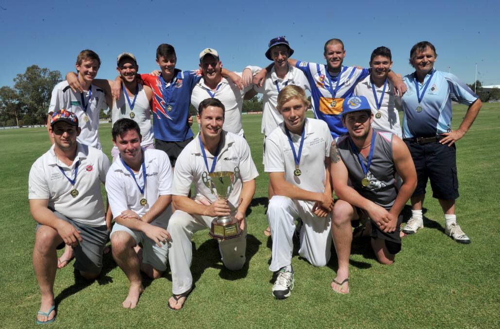 CHAMPIONS: The Griffith cricket side with the Creet Cup after beating West Wyalong in the final at Exies Oval. Picture: Anthony Stipo.