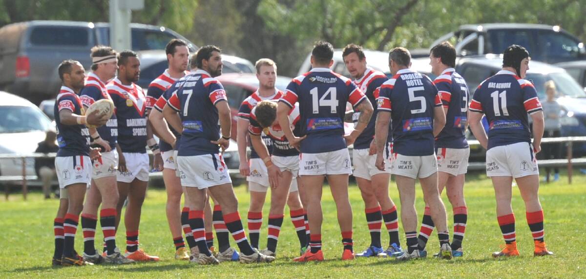 TIME TO SHINE: The Darlington Point-Coleambally Roosters receive a pre-match rev from coach Ryan McGoldrick. Picture: Andrew Piva 