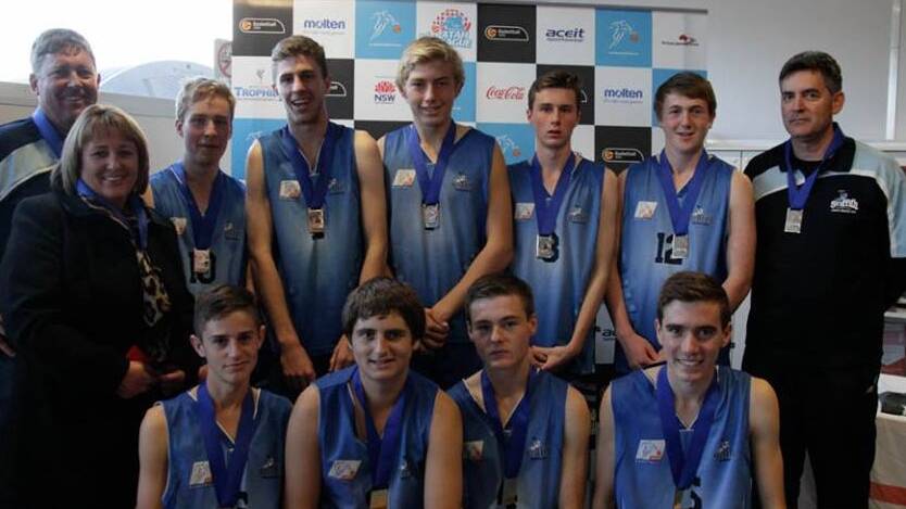 WINNERS: The Griffith Demons under 18 boys after their Western junior League grand final win. Picture: Byron Geddes, Basketball NSW