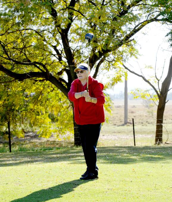 ON TARGET: Shirley Painting keeps a close eye on her ball at Griffith Golf Club. Picture: Wendy Simpkin