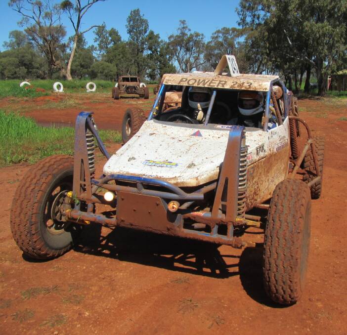 GOOD TO GO: Karl Power gives a thumbs up between drives at the Stackpoole property near Goolgowi. Picture: Supplied