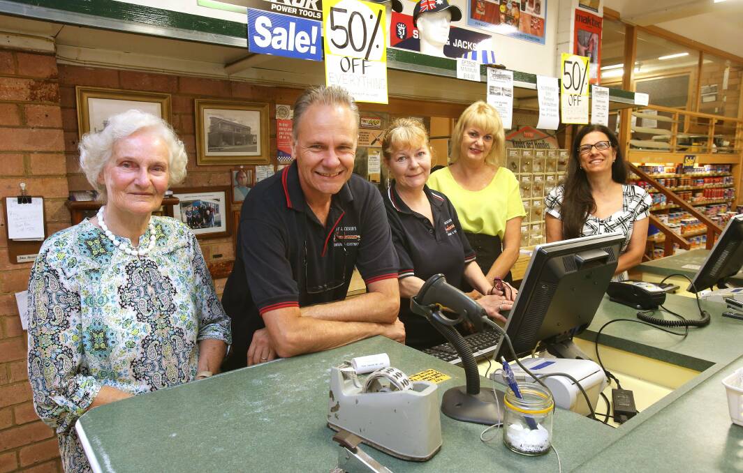 TIMES CHANGE: (Above) Pam Jansen, Ron Farrington, Kay Farrington, Lee James and Rita Farrington were the last of the Jackson family to own the Thirroul hardware store.