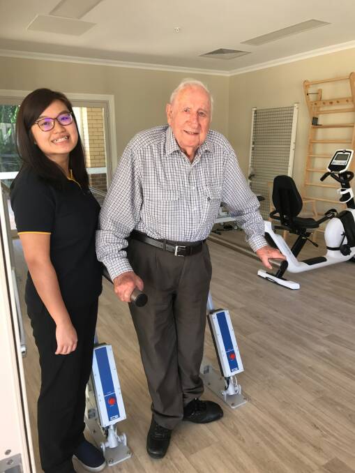 Resident Jim McWilliam and Occupational Therapist Jin Yee Lye using the new exercise room at The Pioneers Lodge.
