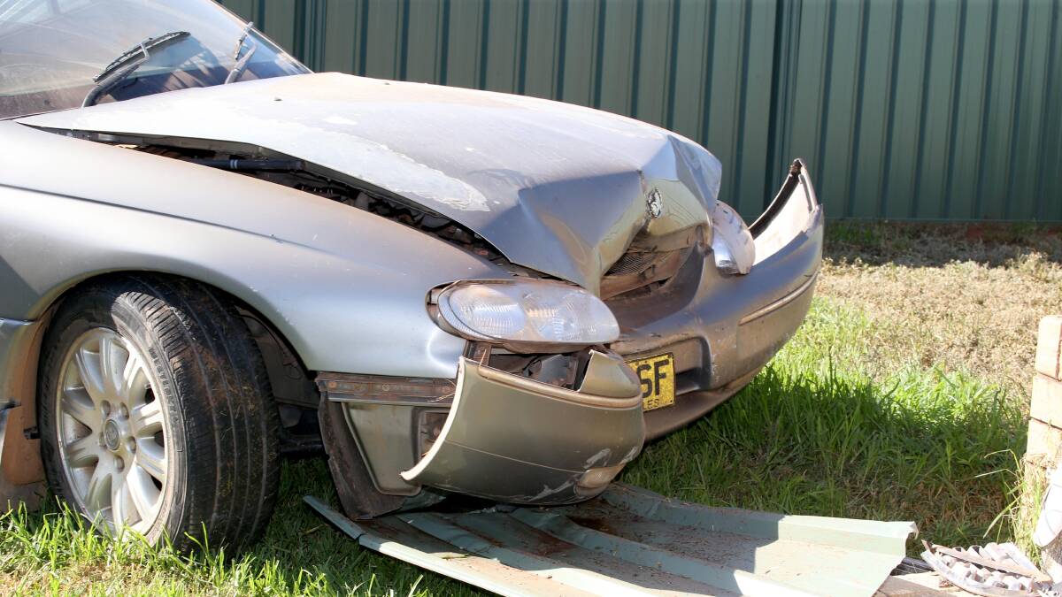 CRASH: The front of a Holden Statesman which ran into a house early on Tuesday morning. Picture: Anthony Stipo.